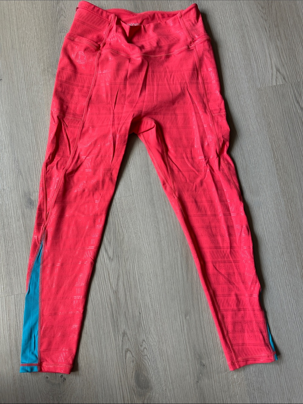 Crowned Athletics original Moana themed Athletic Leggings with Teal Side Panels